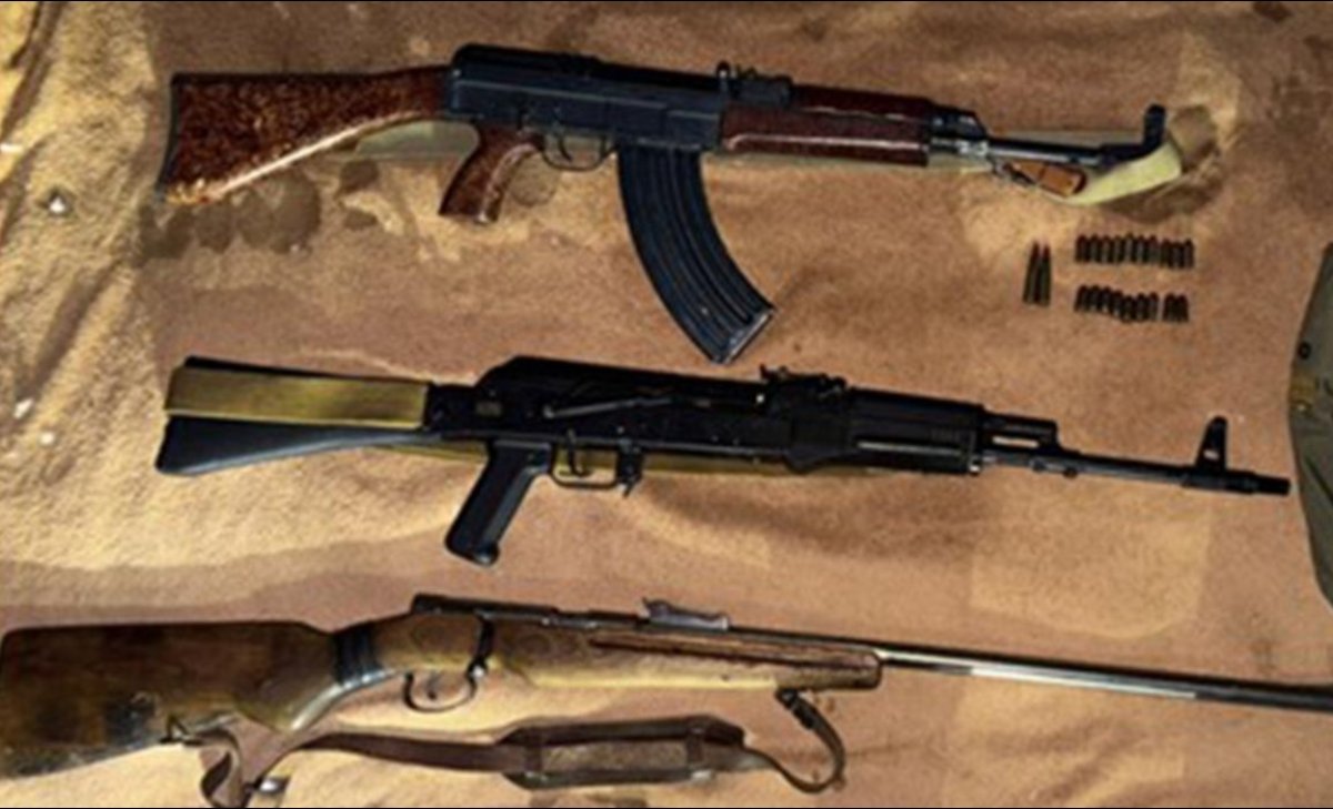 Автоматы и гранаты: КНБ изъял арсенал оружия